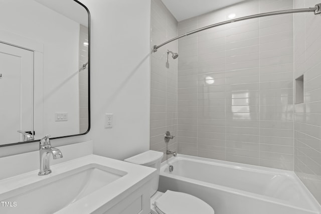 full bath with  shower combination, vanity, and toilet