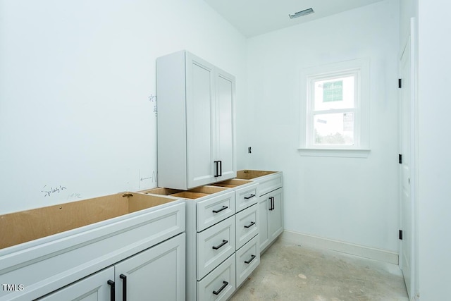 bathroom featuring concrete floors