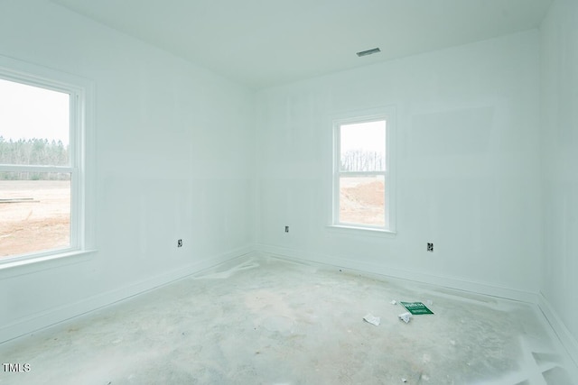 unfurnished room featuring a healthy amount of sunlight