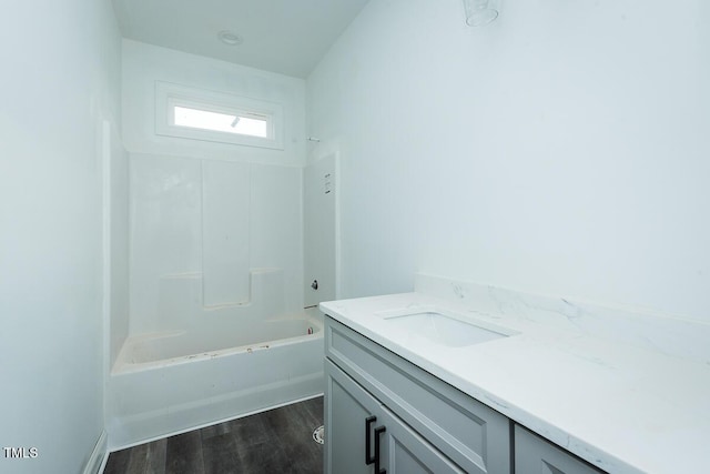 full bath featuring vanity and wood finished floors