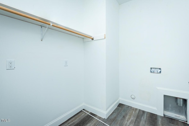 laundry room with hookup for a washing machine, baseboards, laundry area, and dark wood-type flooring