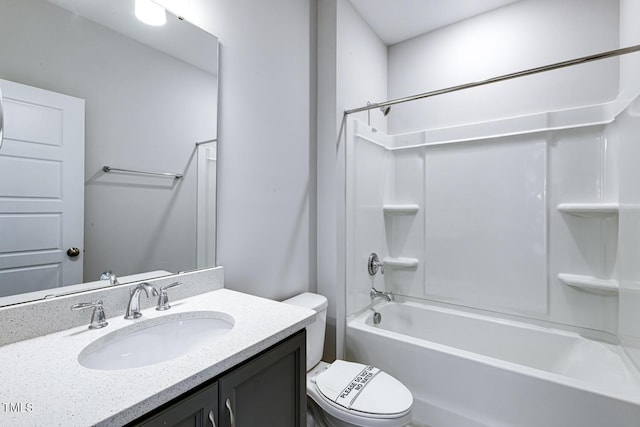 full bathroom with vanity,  shower combination, and toilet