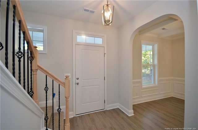 entryway with wood-type flooring