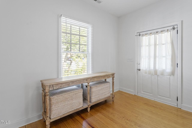 office with hardwood / wood-style floors