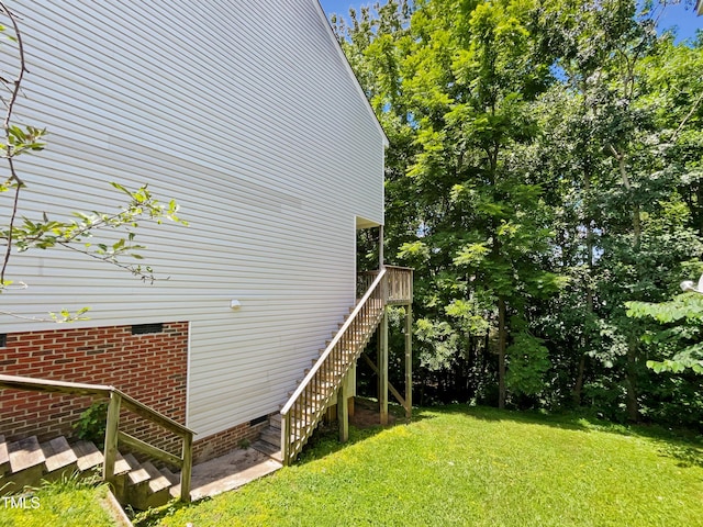 view of home's exterior featuring a lawn