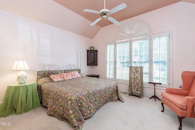 bedroom featuring carpet, ceiling fan, and vaulted ceiling