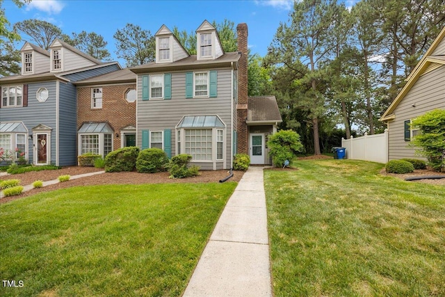 view of front of house with a front lawn