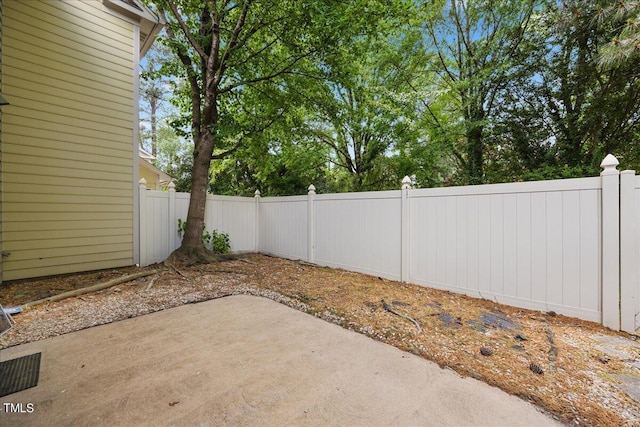 exterior space featuring a fenced backyard