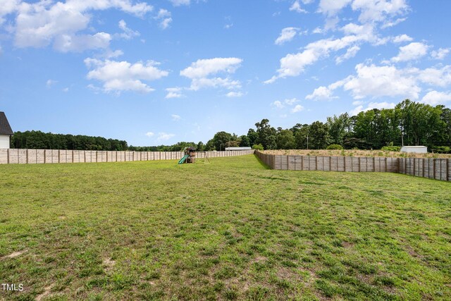 view of yard with a playground