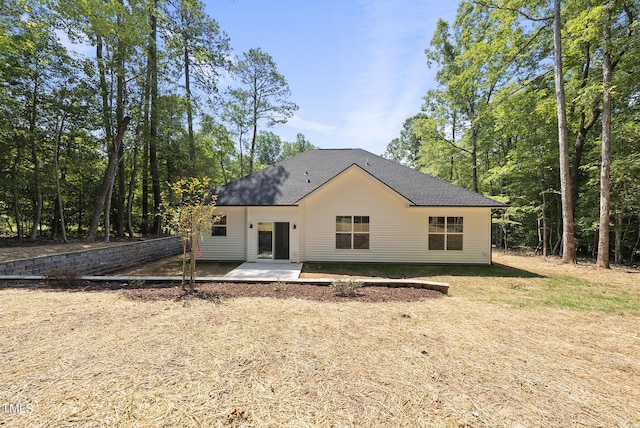 back of house with a patio area