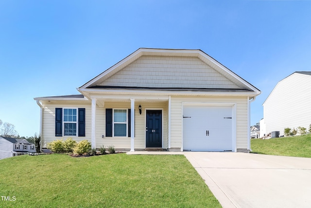 view of front facade with a garage and a front yard