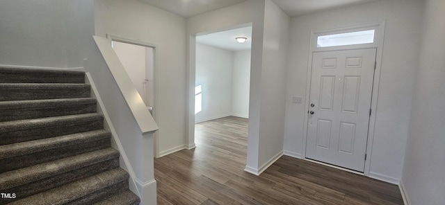 466 Saint Clair Dr, Fuquay Varina, NC 27526 - foyer with dark wood-style floors, stairs, and plenty of natural light