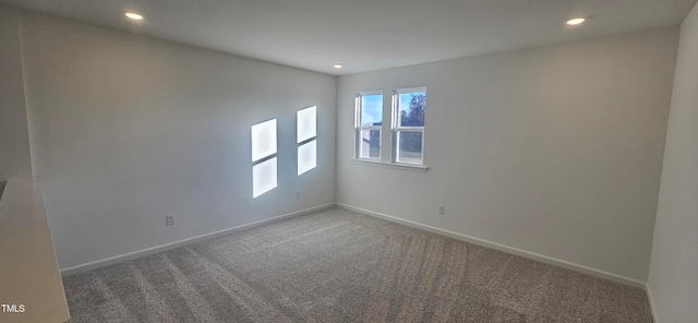 view of carpeted spare room