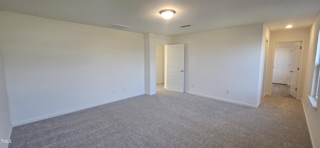 466 Saint Clair Dr, Fuquay Varina, NC 27526 - unfurnished bedroom featuring carpet flooring and baseboards