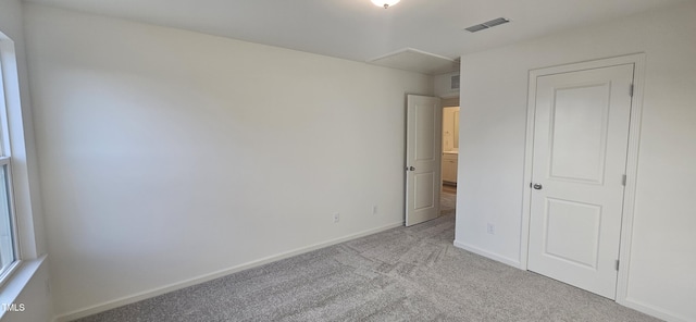 466 Saint Clair Dr, Fuquay Varina, NC 27526 - unfurnished bedroom with light carpet and baseboards