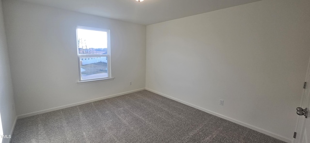 466 Saint Clair Dr, Fuquay Varina, NC 27526 - empty room with dark carpet and baseboards