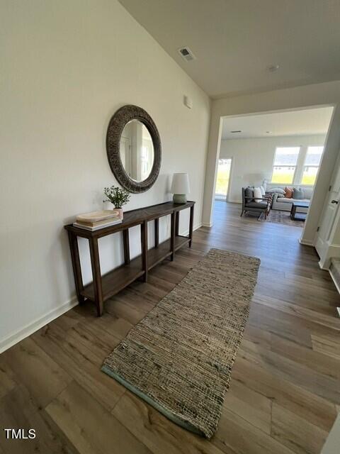 466 Saint Clair Dr, Fuquay Varina, NC 27526 - hallway with wood finished floors and baseboards