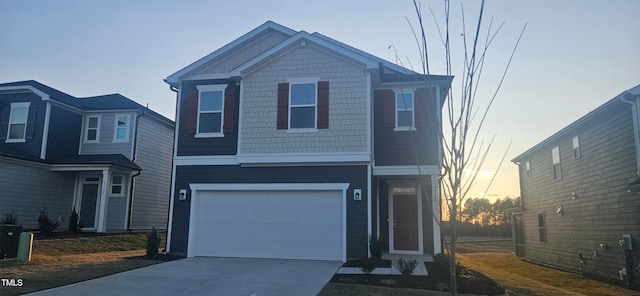 view of front of house with a garage