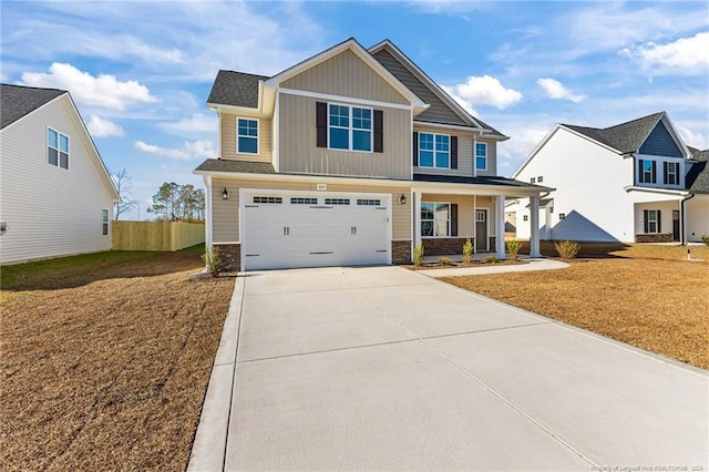 craftsman-style house with a porch and a garage