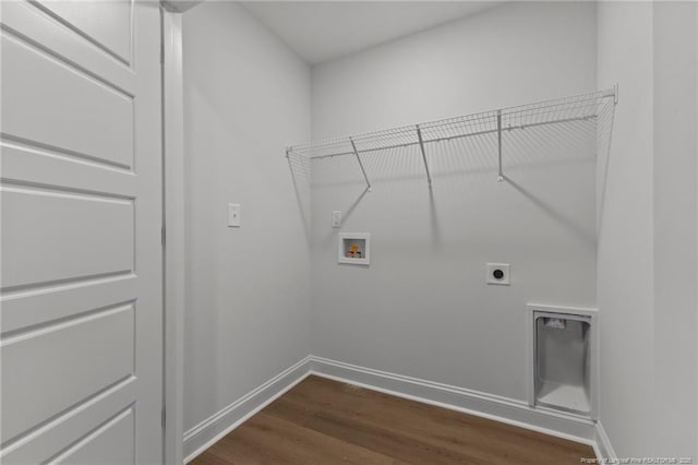 laundry area featuring dark hardwood / wood-style flooring, hookup for a washing machine, and hookup for an electric dryer