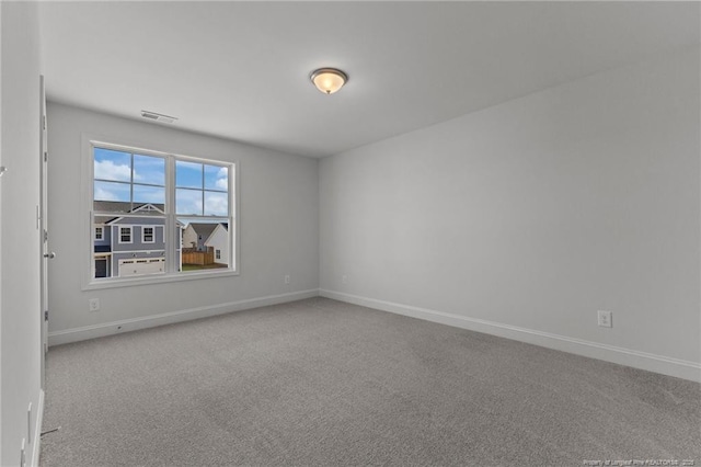 empty room featuring carpet