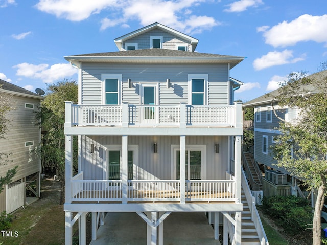 view of front of house with a porch and a balcony