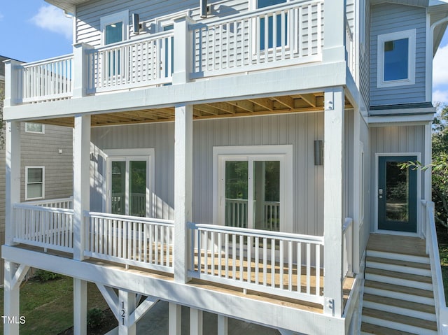 back of house with a balcony