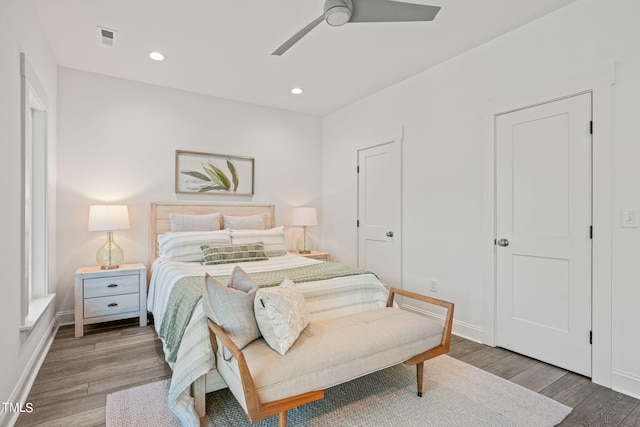 bedroom featuring hardwood / wood-style floors and ceiling fan