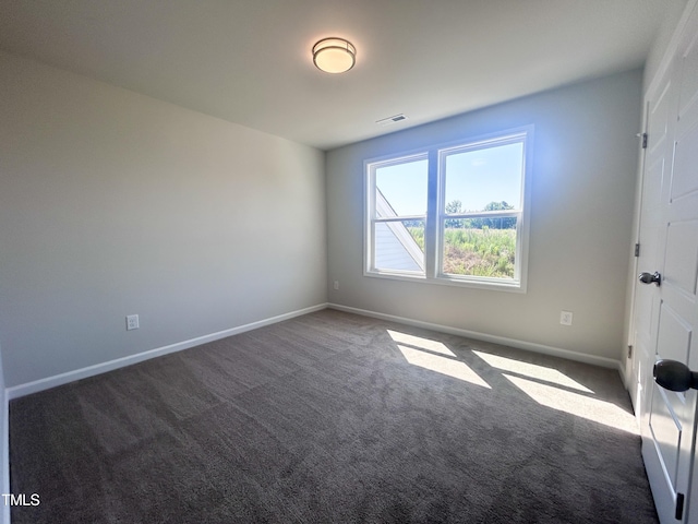 view of carpeted spare room