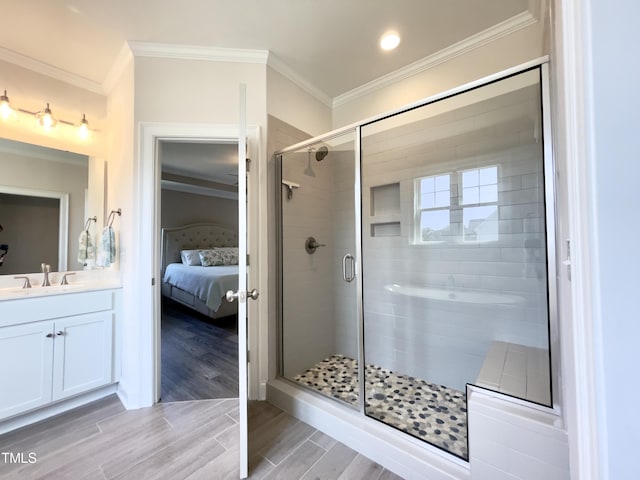 bathroom with vanity, walk in shower, and ornamental molding