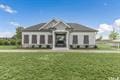 view of front of house featuring a front lawn