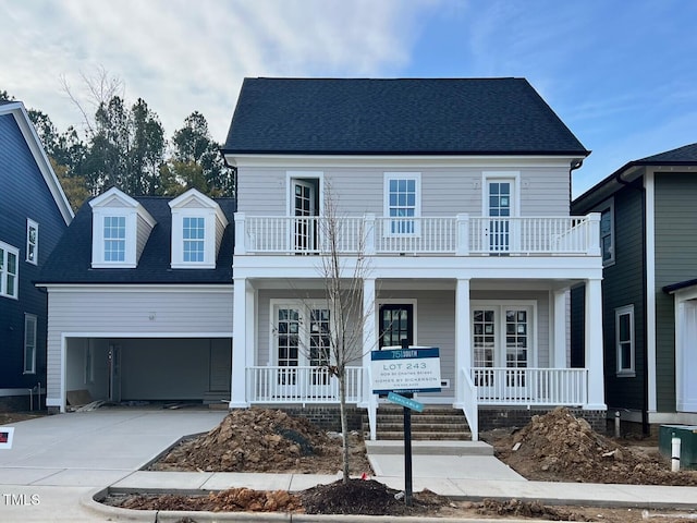 view of front of home featuring a balcony and a porch