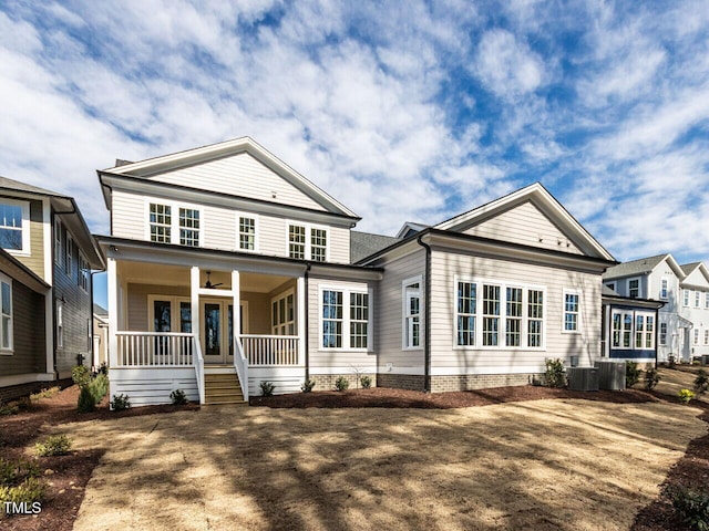 view of front facade featuring a porch and central AC unit