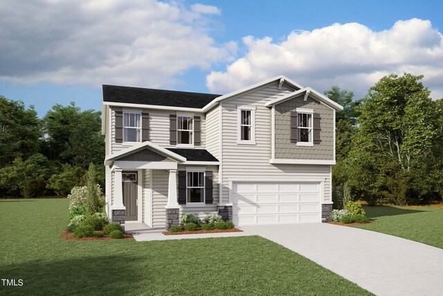 view of front of house with a front yard and a garage