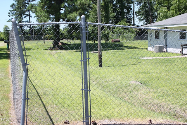 view of yard featuring central air condition unit