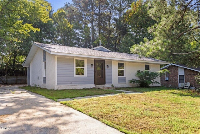 ranch-style house with a front yard