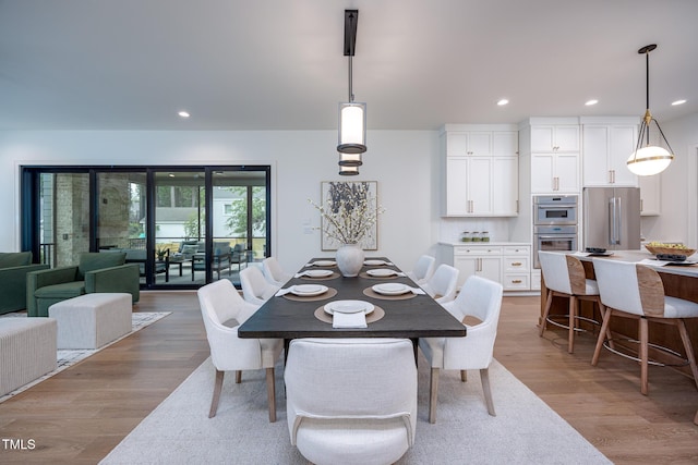 1000 Marilyn Dr, Raleigh, NC 27607 - dining room featuring light wood-style flooring and recessed lighting