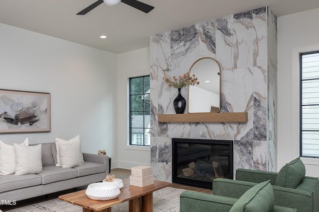 1000 Marilyn Dr, Raleigh, NC 27607 - living room with a ceiling fan, wood finished floors, a fireplace, recessed lighting, and baseboards