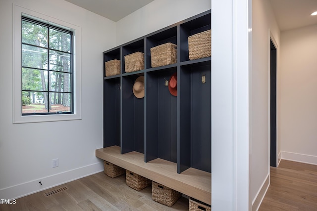 1000 Marilyn Dr, Raleigh, NC 27607 - mudroom with baseboards and wood finished floors