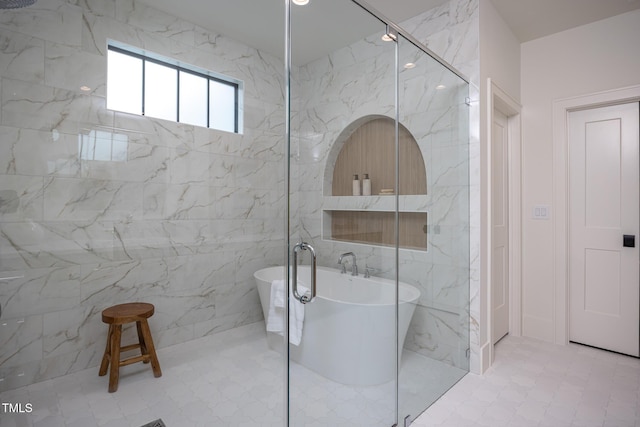 1000 Marilyn Dr, Raleigh, NC 27607 - full bathroom featuring a soaking tub, a marble finish shower, and tile walls