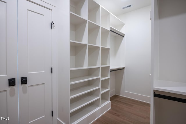 1000 Marilyn Dr, Raleigh, NC 27607 - spacious closet with dark wood-style flooring