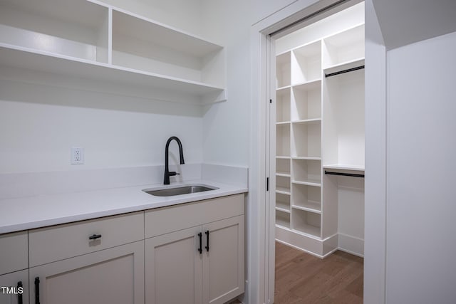 1000 Marilyn Dr, Raleigh, NC 27607 - bar area featuring a sink and dark wood finished floors