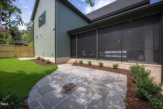 1000 Marilyn Dr, Raleigh, NC 27607 - view of patio with a gate and a sunroom
