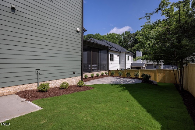 1000 Marilyn Dr, Raleigh, NC 27607 - view of yard featuring a patio and a sunroom