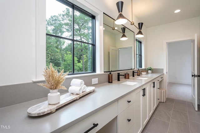 1000 Marilyn Dr, Raleigh, NC 27607 - bathroom with vanity, tile patterned floors, and recessed lighting