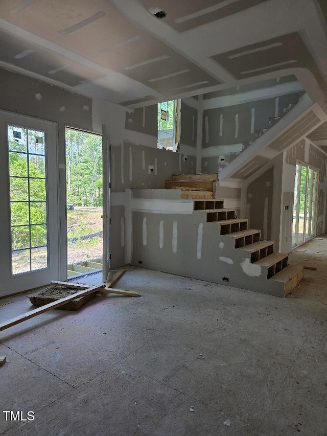unfurnished living room with plenty of natural light