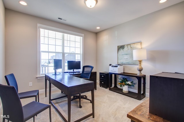 office space featuring baseboards, visible vents, light colored carpet, and recessed lighting