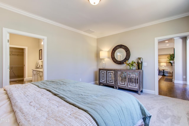 bedroom featuring baseboards, dark colored carpet, and ornamental molding