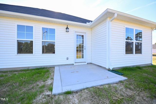 entrance to property with a patio area