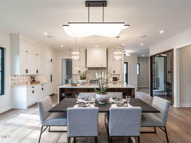 dining room featuring light hardwood / wood-style flooring